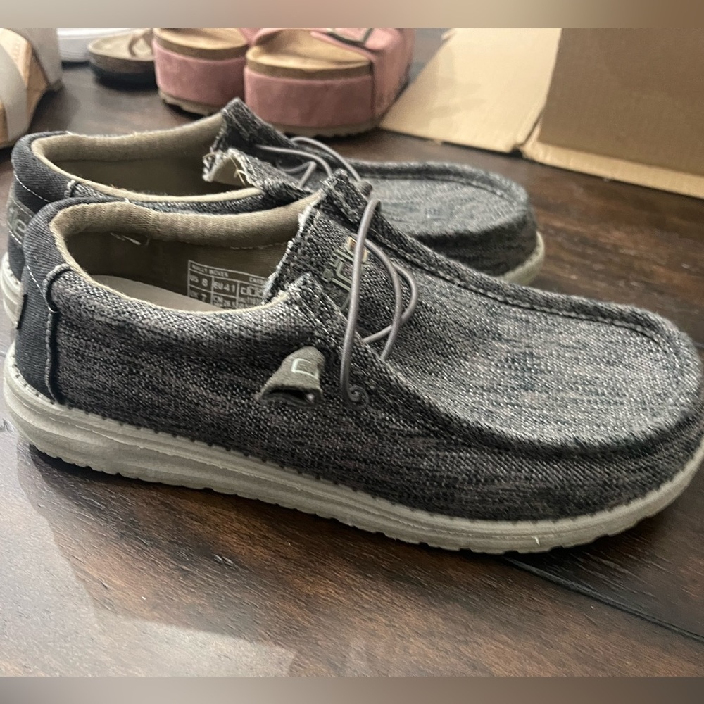 Practically new. son grew out of them pretty fast.  wore them 3-4 times . 8 men